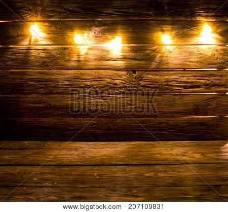 Christmas Lights Decoration On Brown Wooden Background