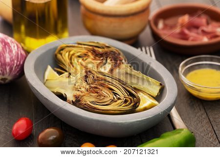 Artichokes in the bowl. Artichokes have one of the highest antioxidant capacities reported for vegetables and potentially lower cholesterol levels.