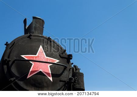 Star on the front of the old locomotive.