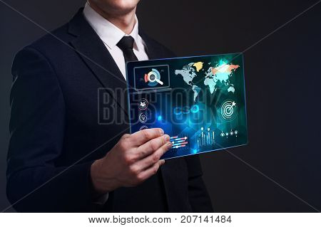 Business, Technology, Internet And Network Concept. Young Businessman Working On A Virtual Screen Of