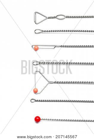Set of instruments for speech therapist on white background
