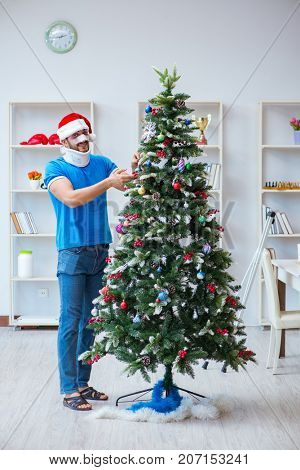 Injured man celebrating christmas at home