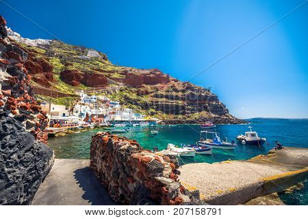 The old harbor of Ammoudi under the famous village of Ia at Santorini, Greece.