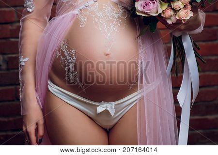 young pregnant women girl in lingerie pretty