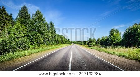 Road way forward direction. Summer day landscape