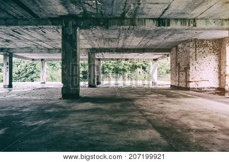 abandoned building urban exploration Sun rays falling down on the flor in old forsaken house. Urbex of spooky and scary old factory. Faded photo of Ancient ruins with destroyed bricks