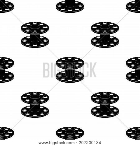 Metal reel for threads.Sewing or tailoring tools kit single icon in black style vector symbol stock web illustration.