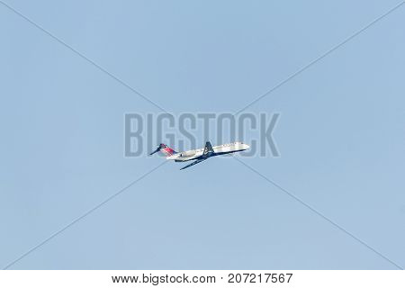 Boston Massachusetts USA 23.09.2017 - Delta Airlines jet plane takeoff at Logan international Airport blue sky