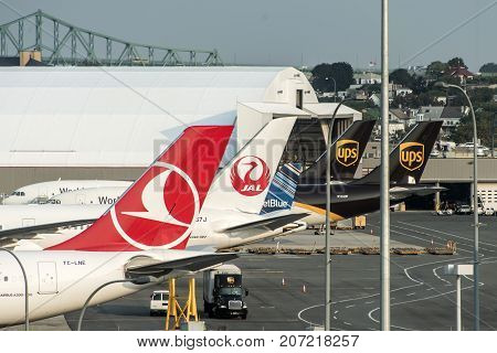 Boston Massachusetts USA 23.09.2017 Rudder of Boeing UPS United Parcel Service and other Airlines at logan international Airport