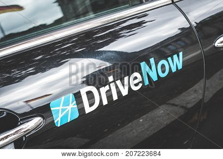 Berlin Germany - circa septmeber 2017: "DriveNow" logo on a car door in Berlin. "DriveNow" is a car sharing company owned by BMW.