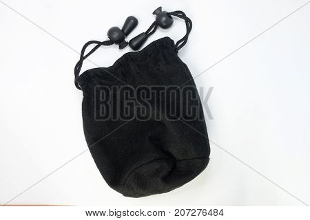 small black pouch with tie isolated on white