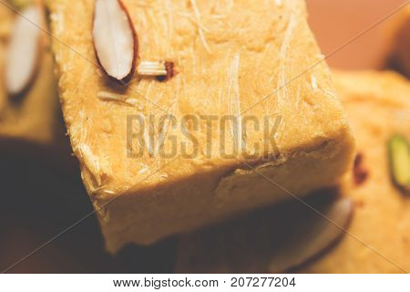 Stock photo of Soan Papdi or Soan roll or Patisa or patisha, popular sweet from India. selective focus