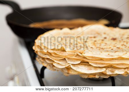 pancakes fried in a pan . Photos in the studio