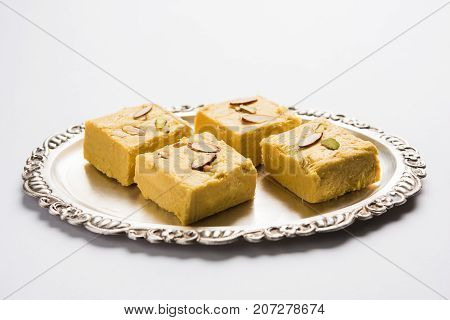 Stock photo of Soan Papdi or Soan roll or Patisa or patisha, popular sweet from India. selective focus