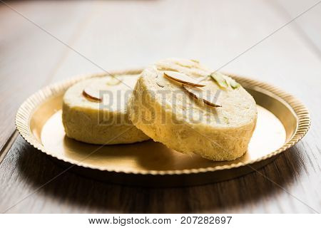 Stock photo of Soan Papdi or Soan roll or Patisa or patisha, popular sweet from India. selective focus