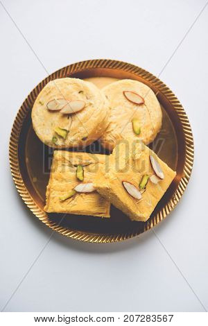 Stock photo of Soan Papdi or Soan roll or Patisa or patisha, popular sweet from India. selective focus