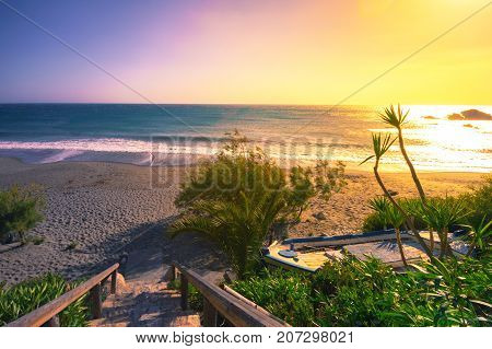 Tropical sandy beach of Ligres, Crete, Greece, with big waves.