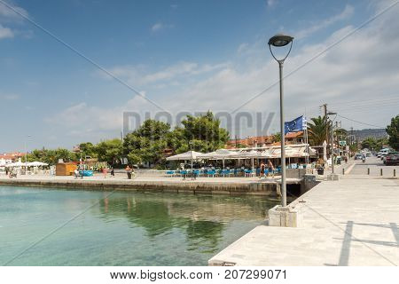 CHALKIDIKI, CENTRAL MACEDONIA, GREECE - AUGUST 25, 2014:  Panoramic view of port of Nikiti at Sithonia peninsula, Chalkidiki, Central Macedonia, Greece