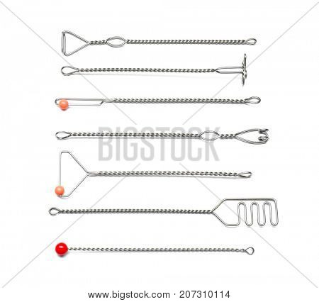 Set of instruments for speech therapist on white background
