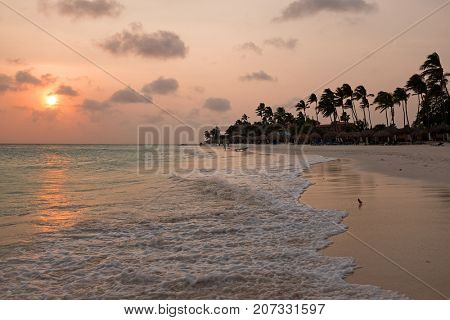 Sunset on Druif beach on Aruba island in the Caribbean Sea