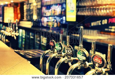 LONDON, UK - SEPTEMBER 21, 2017: Draft Beer in a traditional english pub