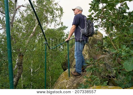 Hiker on the Devil's Wall between Timmenrode and Blankenburg in the Harz Mountains