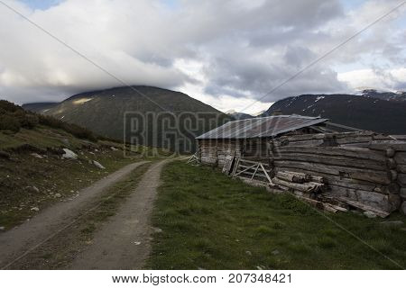 A Cabin In Norwegian Mountains Jotunheimen On A Wonderfull Day
