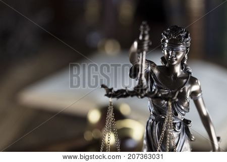 Legal system. Law and justice concept.Statue of justice and books.