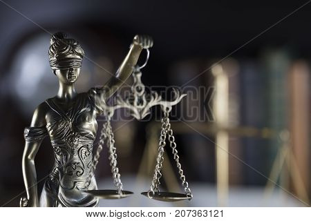 Legal system. Law and justice concept.Statue of justice and books.