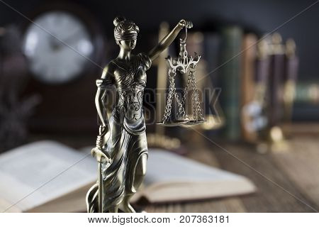 Legal system. Law and justice concept.Statue of justice and books.