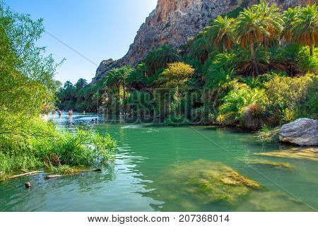 View of Kourtaliotis river and canyon near Preveli beach at Libyan sea, river and palm forest, southern Crete, Greece on August 26, 2017.
