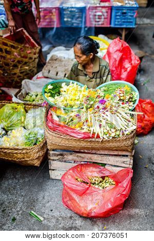 Bali, Indonesia - August 30, 2013: Pasar Kumbasari Morning market, flowers, fruit and vegetable market. Ubud, Bali, Indonesia