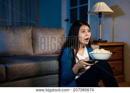 Lovely Young Woman Holding Popcorn Snack