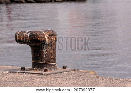 Rusty Metal Mooring Bolard For Big Ship