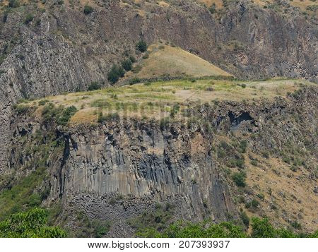 Rock formation basalt columns Symphony of the Stones near Garni Armenia selective focus.