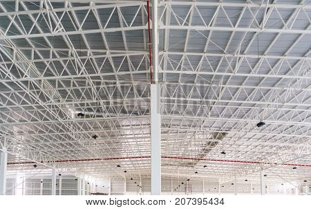 Structure of steel roof frame and metal sheet in building construction site