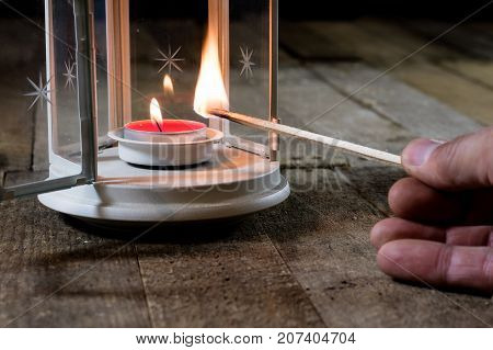 Two Small Lanterns On A Wooden Table. Candle In Old Latarence. Wooden Table.