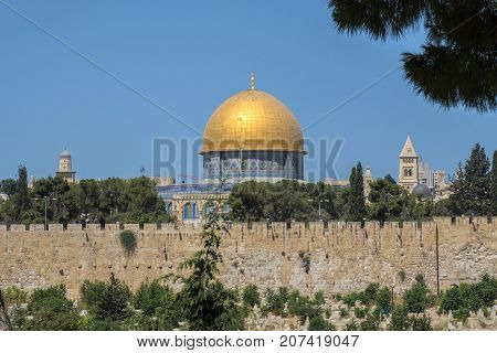The Mosque Dome of the Rock on the top of the Temple Mount from the Mount of Olives (Israel, Jerusalem)