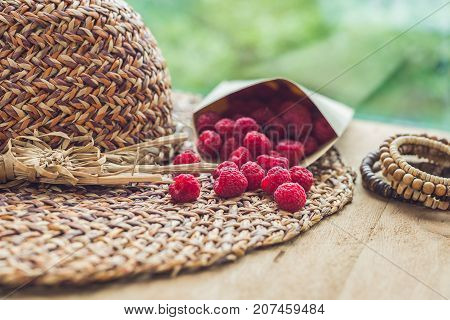 Summer Holiday, Vacation, Relaxation Concept. Raspberries, Straw Hat. Free Text Copy Space. Summer V