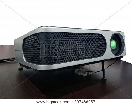 LED projector on wood table in a room projector home theater concept.