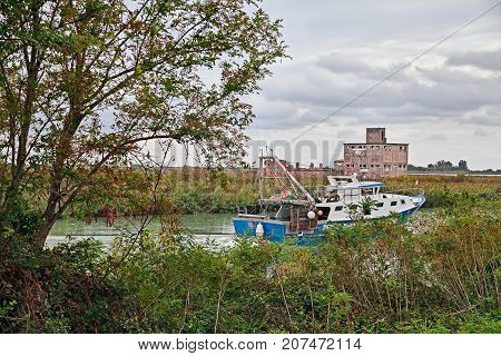Rosolina, Veneto, Italy: landscape of the Adige river mouth in the nature reserve Po river delta park