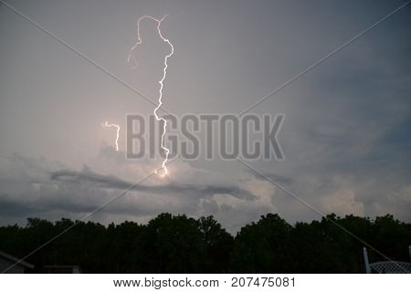 storm clouds lighting up the sky with lightning  during severe storms