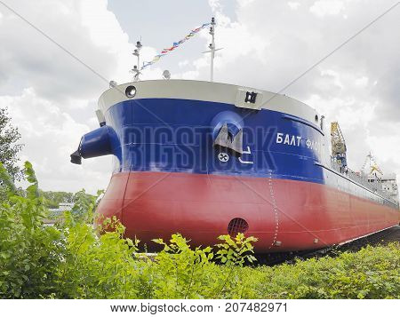 Novgorod, Russian Federation - July 21, 2017: Oil tanker before launching. New ship in a shipyard.