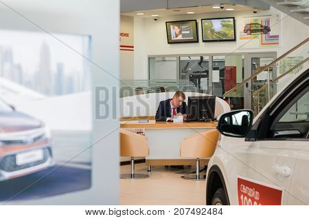 Manager And Car In Showroom Of Dealership Toyota In Kirov City In 2016