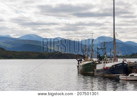Ullapool Scotland - August 15 2010: View of the fishing port of Ullapool in the Highlands in Scotland United Kingdom