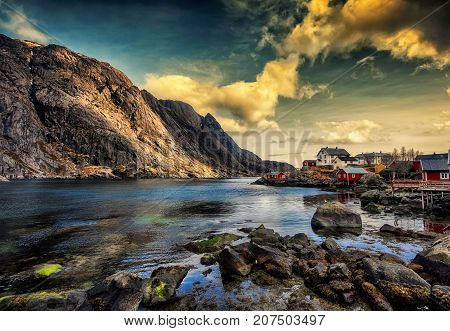 The photography shows part of Nusfjord in Flakstad island, Lofoten archipegalo.