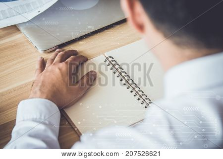 Businessmen use a pencil point to business document during discussion at meetingVintage filters