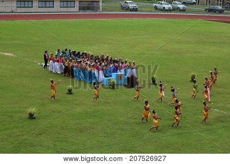 Thai dance performances of students in the stadium Darunothai School Trang Thailand August 19 2016
