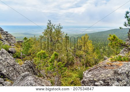 Rocks On Mountain Kachkanar. The Urals. Russia
