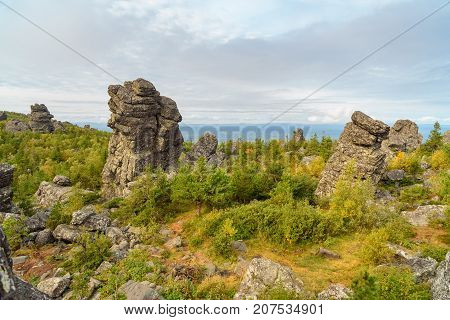 Rocks On Mountain Kachkanar. The Urals. Russia